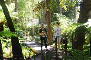 Meg and Georgia planning elements of the tour as they walk through Fern Gully, Royal Botanic Gardens Victoria (Image: Pip Hirst)