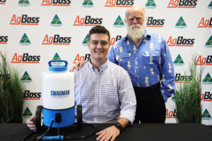 AgBoss CEO Scott Jensen (left) with Charles Sweeney and a model of the Swagman Sprayers