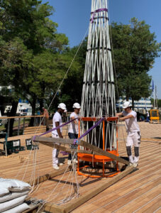 Canopees being raised in France using good, old-fashioned human power along with a counter lever and ropes (Image: Urban Canopee Australia)