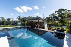 The resort style of the backyard, including a pool cabana (Image: All Things Visual Pty Ltd)