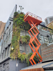 Scissor lift in action maintaining a city green wall (Image: Fytogreen)