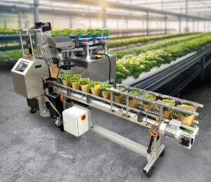 German firm Weber Verpackungen presented a packaging machine for potted plants that claims productivity increases up to 100% compared with manual hand packing