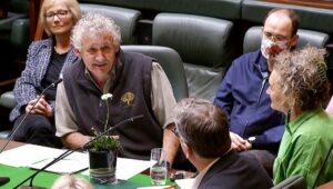 John Arnott talking plant conservation in the Victorian Parliament Chamber (Image: Victorian Parliament)