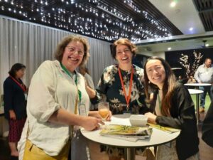 Cocktail party (L-R) Claudia Ait-Touati and volunteers Kate Coenen and Karen Lau (Image: Meg Chatterton)