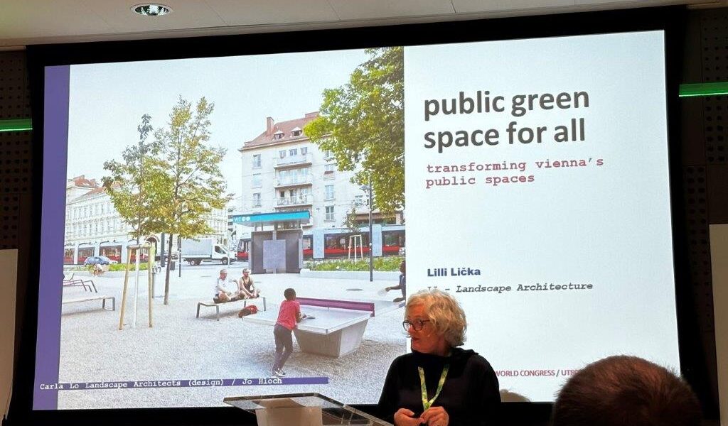 Professor Lili Licka discussing “Public green space for all” to a full room of urban greening professionals