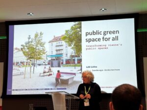 Professor Lili Licka discussing “Public green space for all” to a full room of urban greening professionals