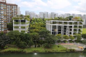 Punggol Mall in Singapore uses green roofs, podium gardens and tiered levels that retain water to avoid peak discharge into the river system – a great example of a nature-based storm water management solution (Image: Michael Casey)