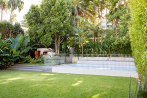 A new lawn provides space for children to play, along with a clear line of sight from the house to the new pool in this backyard designed for privacy (images supplied by the Landscape Association)