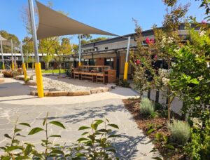 Paved areas receive shade from deciduous trees planted on the northern side, reducing overall heat in summer, while hardy plants such as Elaeagnus provide separation (Image: Botanical Traditions Pty Ltd)