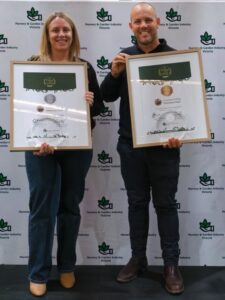 Symone Brown and Matt Mansfield receive the 2026 Plant of the Year award for Corymbia ficifolia ‘Precious Pearl’ (Image: Ludovic Vilbert, Inwardout Studio)